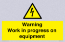 warning-work-in-progress-on-equipmentwith-electrical-hazard-symbol~